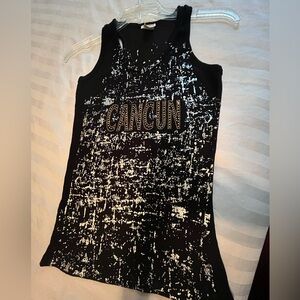 Women’s black razor back “Cancun” tank. Very good condition.